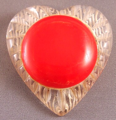 BP170 lucite/red bakelite heart pin